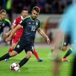 Wales' midfielder Aaron Ramsey takes a p